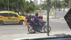 7 kişi bir motosiklette