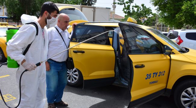 Torbalı'da taksi ve minibüsler dezenfekte edildi