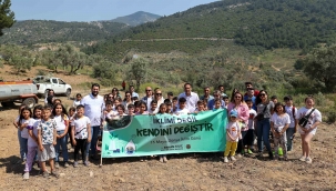 Bucalı çocuklardan zeytin fidanı dikimi