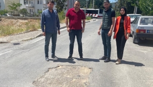 ''Gaziemir'deki her mahallenin ortak sorunu bozuk yollar''
